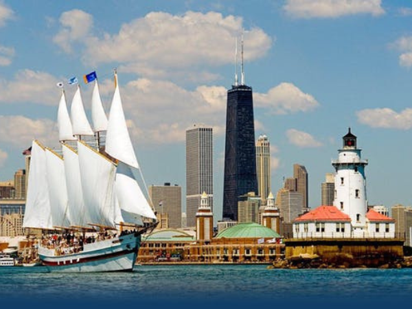 Tall Ship Windy sailing in front of Chicago's Navy Pier and Lighthouse